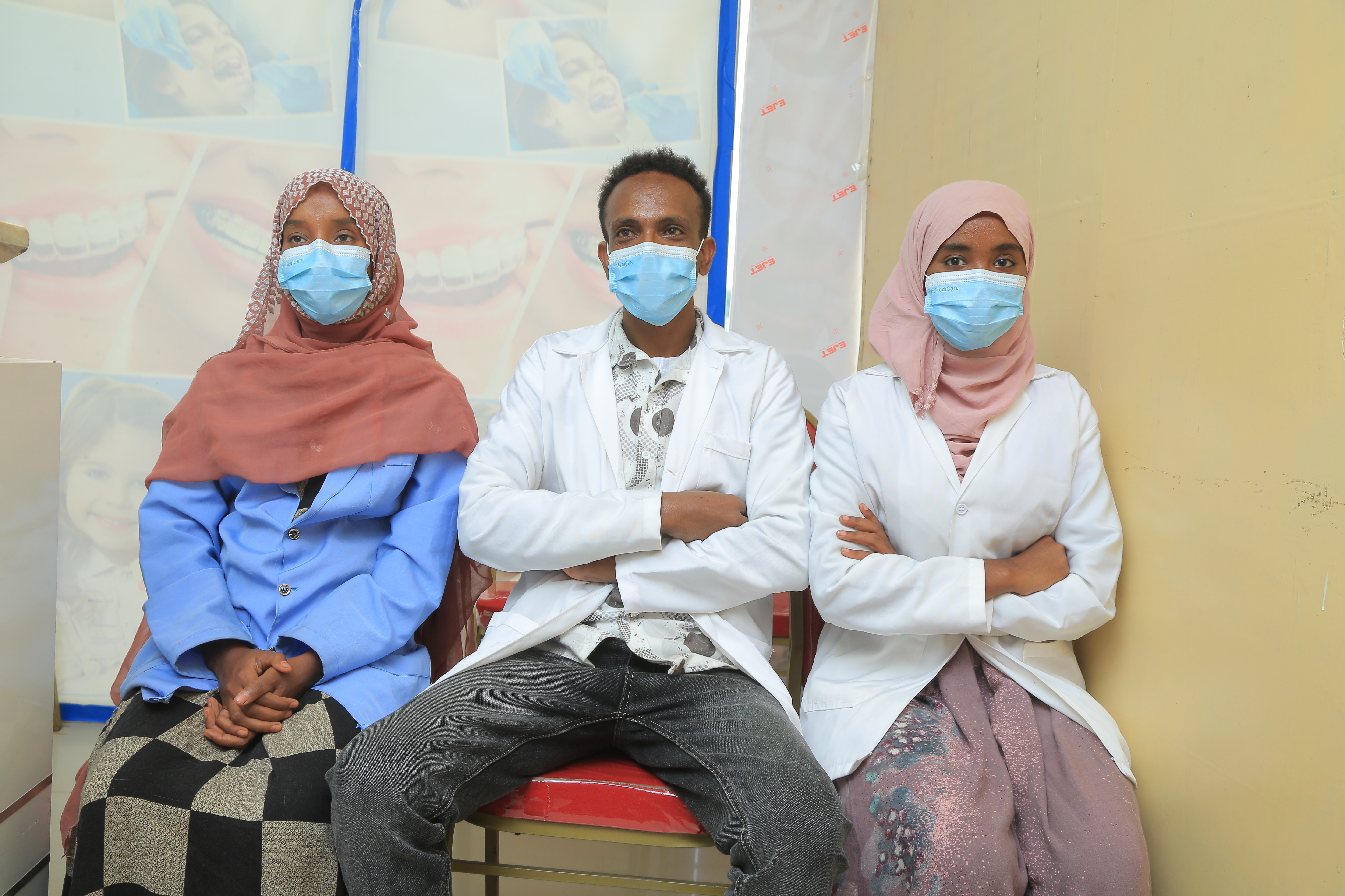 Dentist consulting with a patient